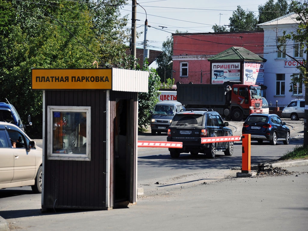 Платная автомобильная стоянка. Парковка незаконная Краснодар. Платная стоянка в Новотитаровской. Парковка возле администрации Владивостока официальный сайт.